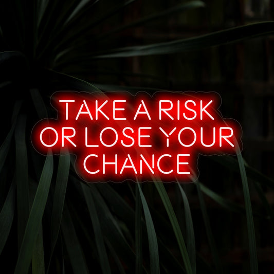 "Take a Risk or Lose Your Chance Neon Sign" inspires with its bold message, casting a daring glow that encourages courage and seizing opportunities in your space.