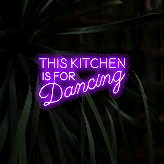 "This Kitchen Is For Dancing Neon Sign" adds liveliness with its playful message, casting a vibrant glow that encourages joyful moments and dancing in your kitchen space.