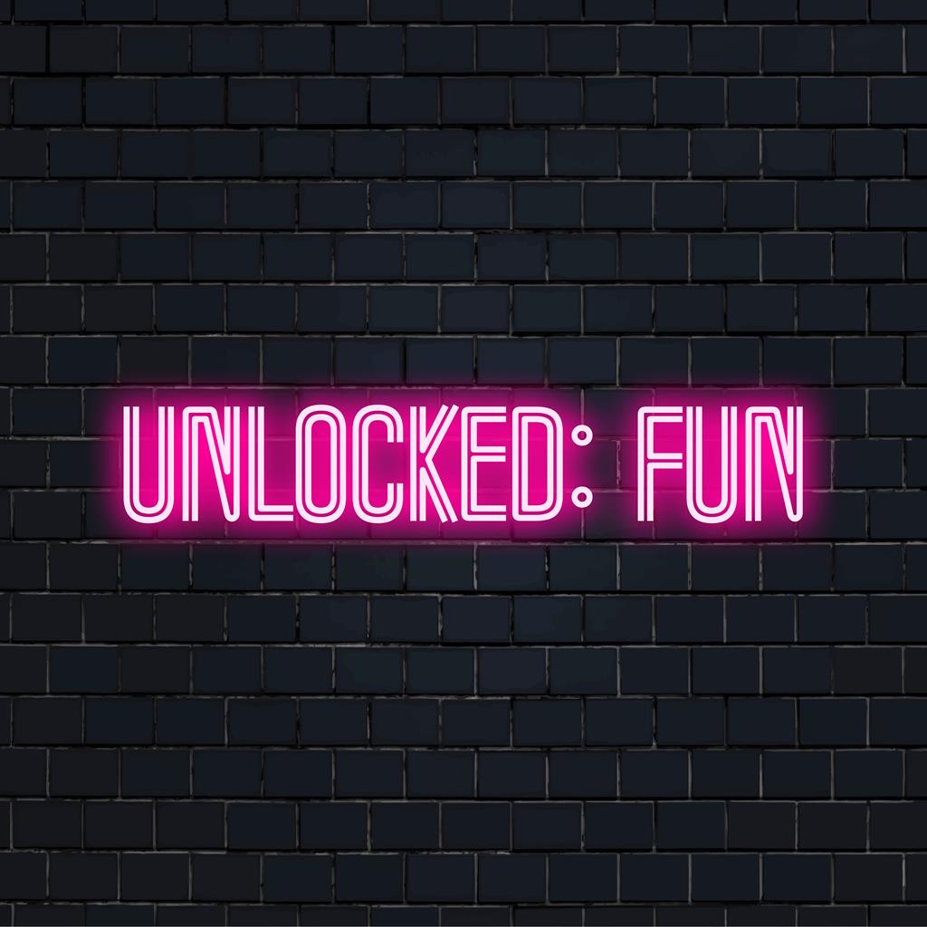 Panneau néon LED coloré indiquant Unlocked Fun, capturant une énergie vibrante, parfait pour un art mural unique et une décoration intérieure lumineuse.