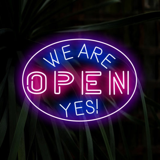 "We Are Open Yes! Neon Sign" radiates enthusiasm with its affirmative glow, creating an energetic and welcoming atmosphere in your space.