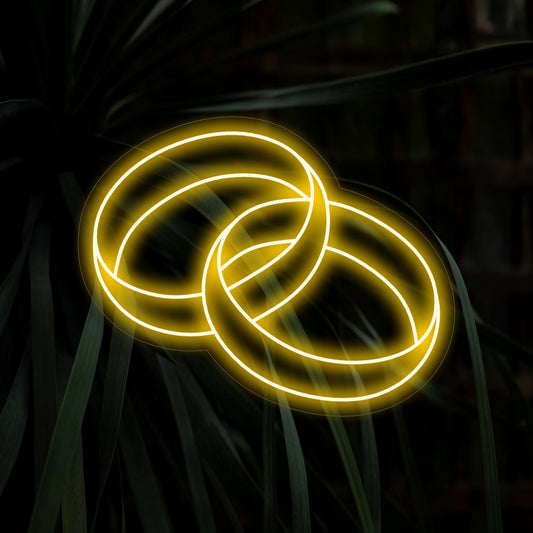 "Wedding Ring Neon Sign" adds a touch of romance with its elegant design, casting a soft and enchanting glow that celebrates love and commitment.