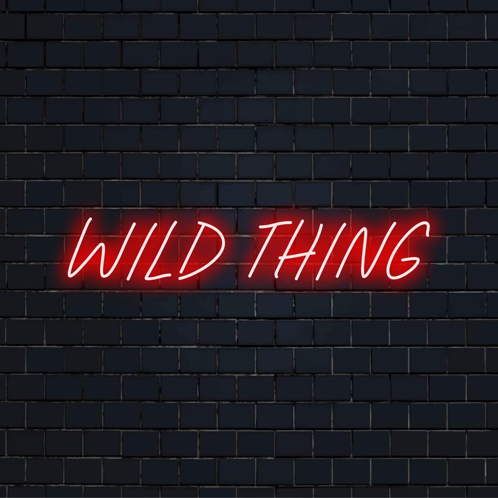 Vibrant 'Wild Thing' custom LED neon sign illuminating a lively aesthetic, ideal for unique wall art or decor.