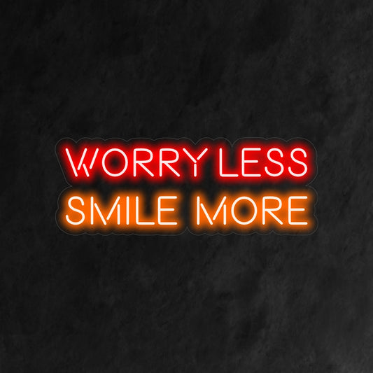 "Worry Less Smile More Neon Sign" is a positive and uplifting addition to your interior. A neon light that encourages a carefree attitude and a bright smile.