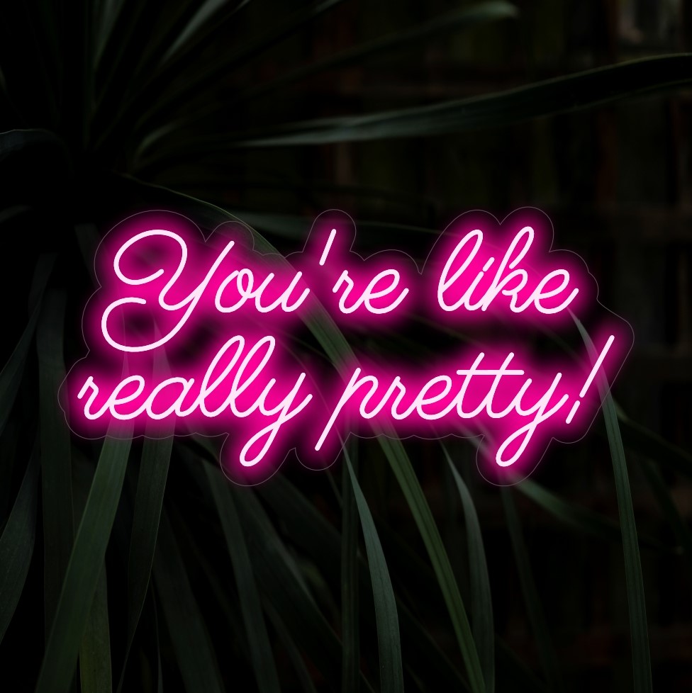 "You're Like Really Pretty! Neon Sign" spreder positivitet med sin charmerende glød og skaber en opløftende atmosfære, der hylder skønheden i dit rum.