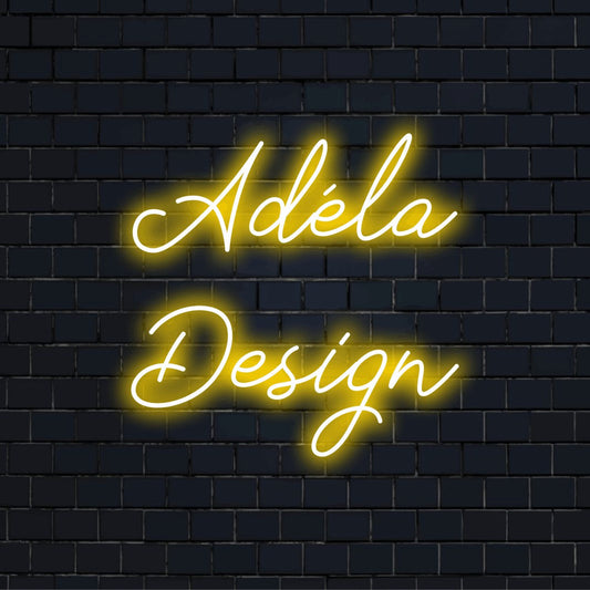 Adela Design Personalized LED Neon Sign, bright neon lettering against brick backdrop