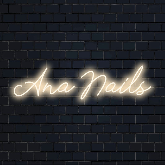 Ana Nails Personalized LED Neon Sign, glowing lettering on dark brick background