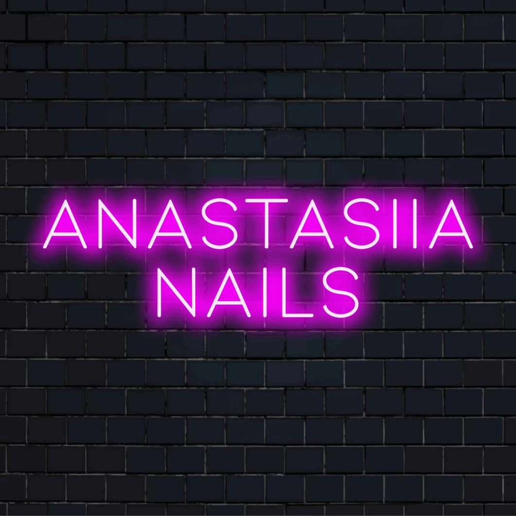 Anastasiia Nails Custom Name Neon Sign, glowing wall decor against brick backdrop