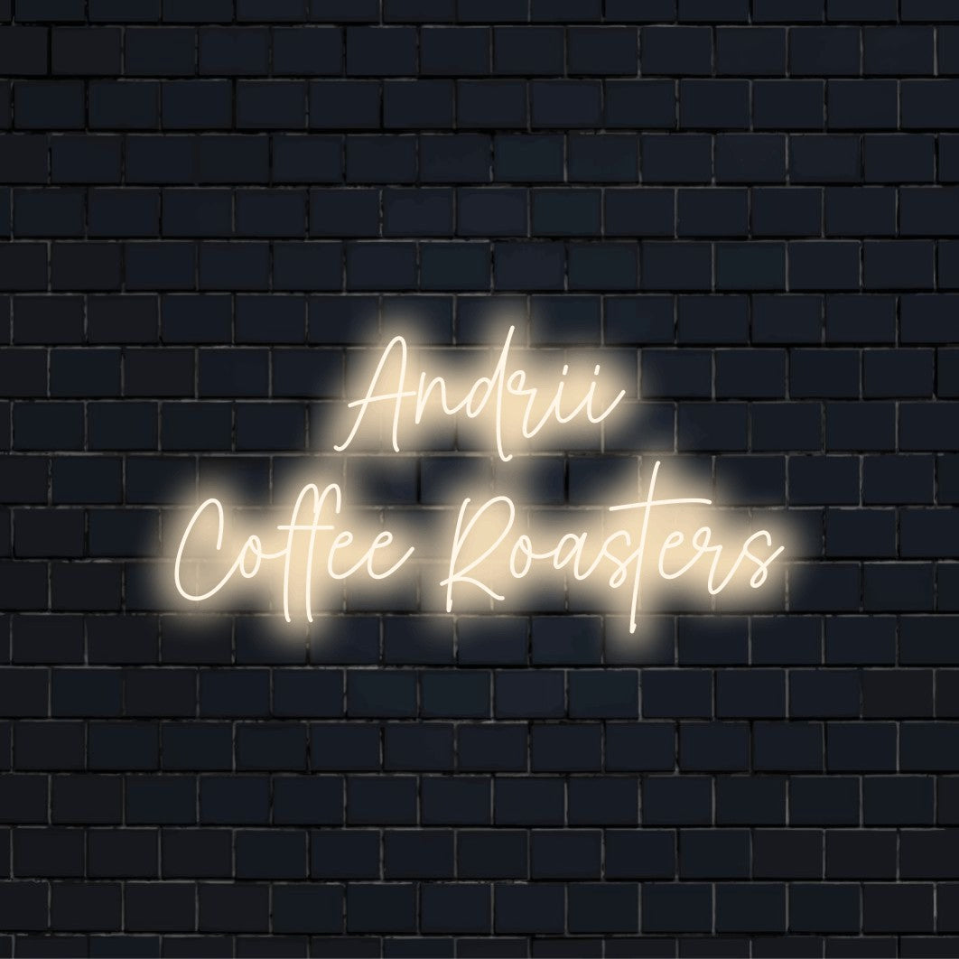 Andrii Coffee Roasters Custom Name Neon Sign, soft neon glow on dark brick background