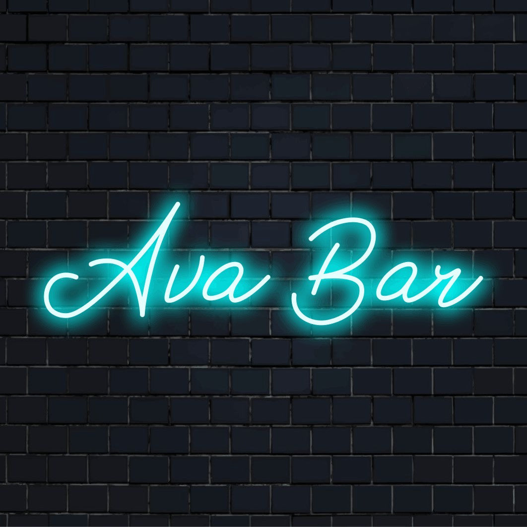 Ava Bar Personalized Neon Light with soft neon glow against brick backdrop