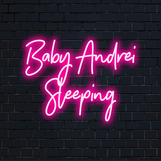 Baby Andrei Sleeping Personalized Neon Light with bright LED glow on dark brick wall