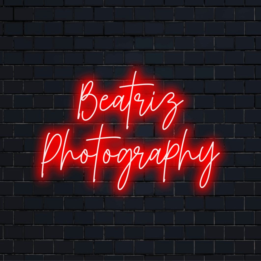 Beatriz Photography Personalized Neon Light with bright neon glow on dark brick background