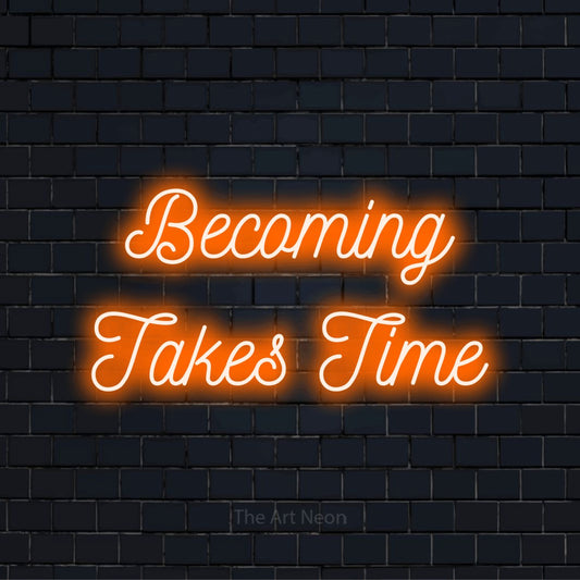 "Becoming Takes Time" neon text design on a black brick wall