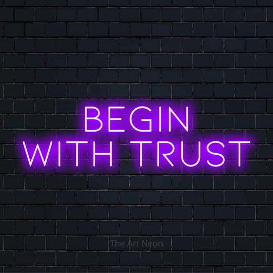 "Begin With Trust" glowing LED neon sign on a black brick wall