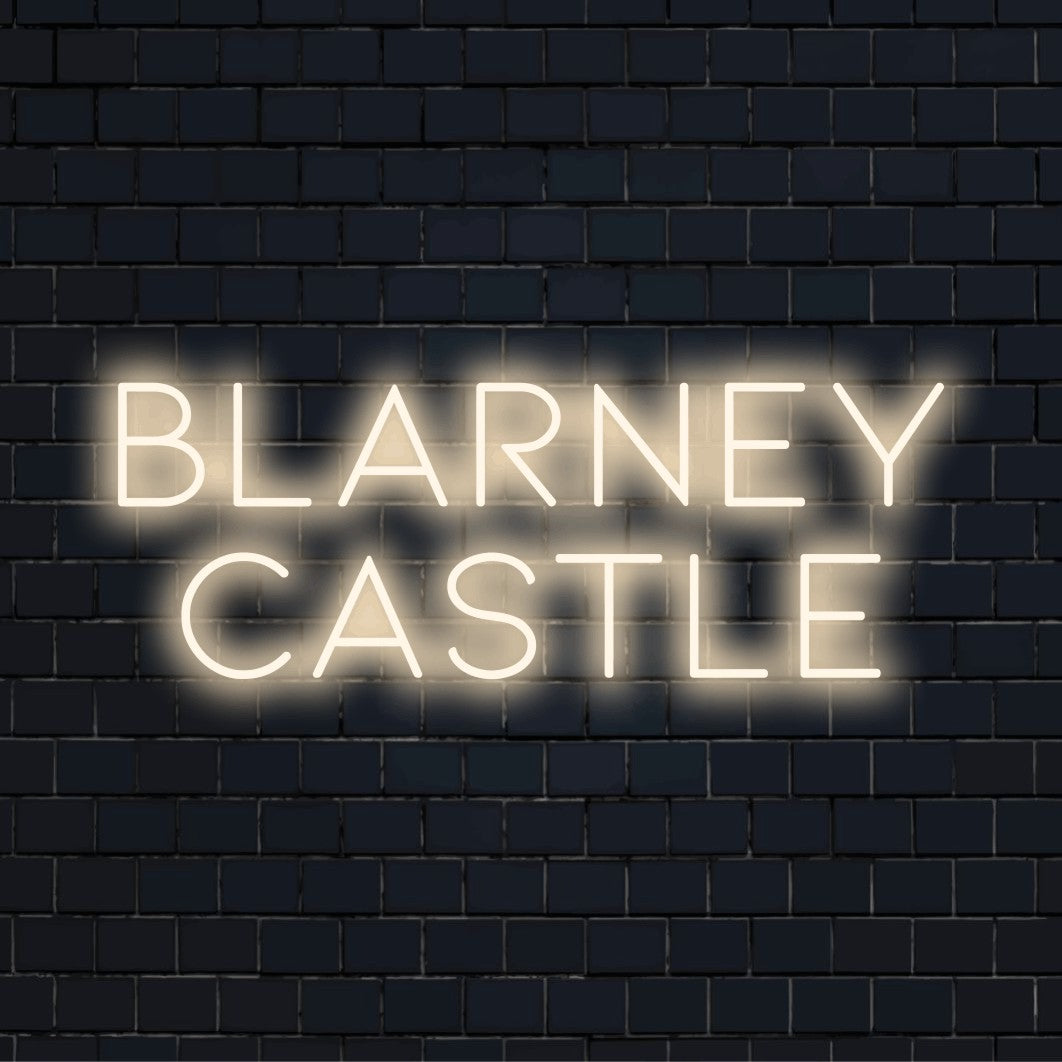 Blarney Castle Neon Light with bright neon glow on dark brick background