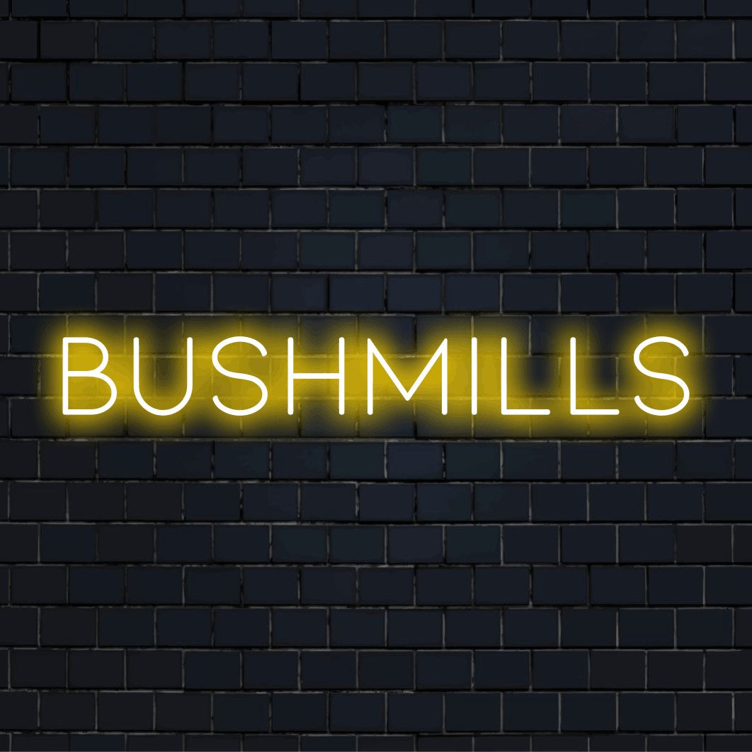 Bushmills LED Neon Sign, bright neon glow against black brick wall