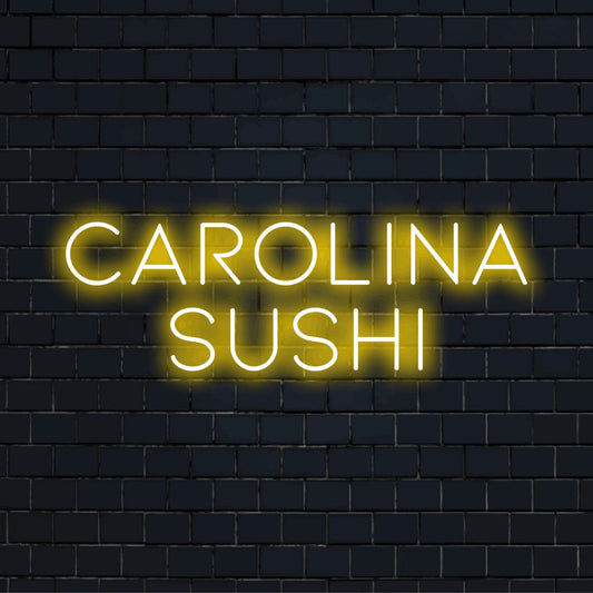 Carolina Sushi Custom Name Neon Sign, neon text light against brick backdrop