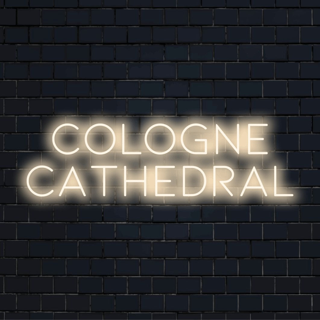 Cologne Cathedral Neon Sign, bright LED glow against brick backdrop