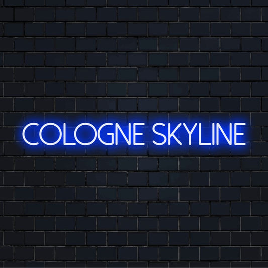 Cologne Skyline Neon Light with soft neon glow against brick backdrop