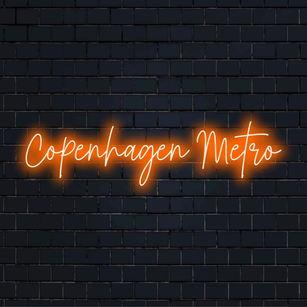 Copenhagen Metro Neon Sign, glowing lettering on dark brick background
