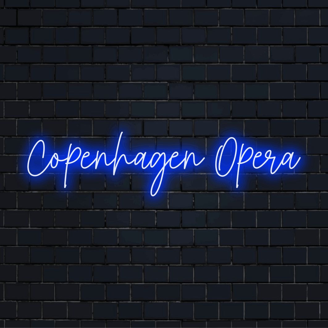 Copenhagen Opera Neon Sign, glowing neon text against black brick wall