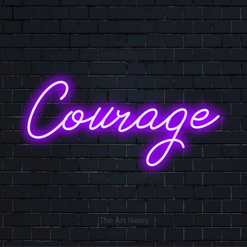 "Courage" LED neon sign on a black brick wall
