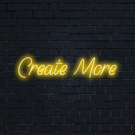 Create More LED Neon Sign, glowing wall decor against brick backdrop