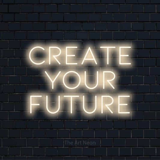 "Create Your Future" glowing LED neon sign on a black brick wall
