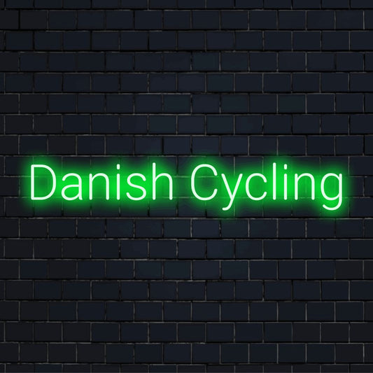Danish Cycling Neon Sign, bright neon glow against brick backdrop
