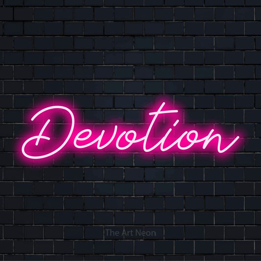 "Devotion" neon text design on a black brick wall