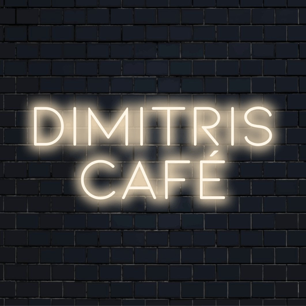 Dimitris Cafe Personalized LED Neon Sign, soft neon glow against black brick wall