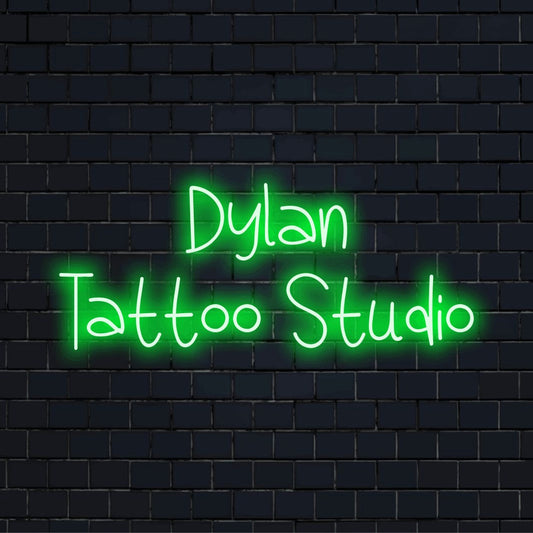 Dylan Tattoo Studio Personalized LED Neon Sign, neon text light on dark brick background