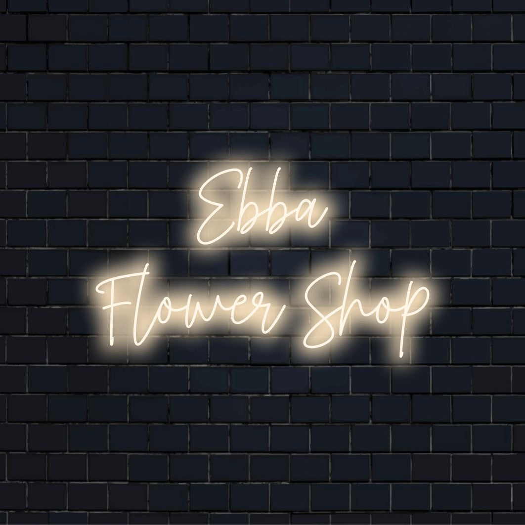 Ebba Flower Shop Personalized LED Neon Sign, neon text light against brick backdrop