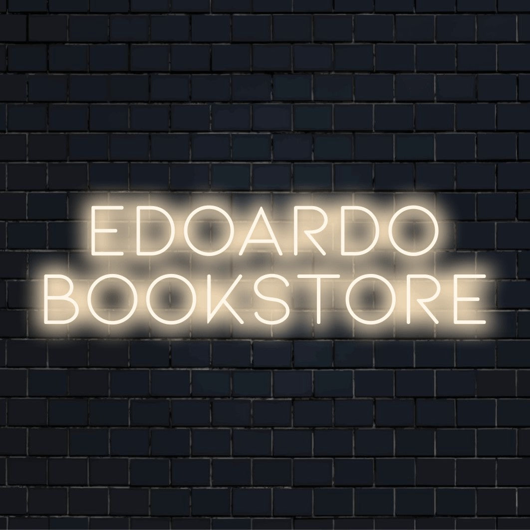 Edoardo Bookstore Personalized LED Neon Sign, glowing neon text against brick backdrop
