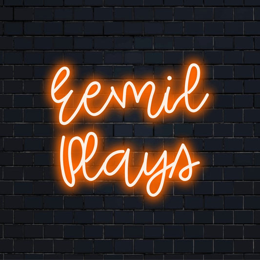 Eemil Plays Personalized Neon Light with glowing wall decor against black brick wall