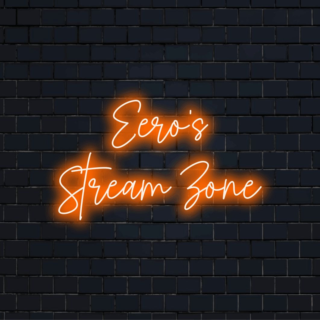 Eero_s Stream Zone Personalized Neon Light with glowing wall decor against black brick wall