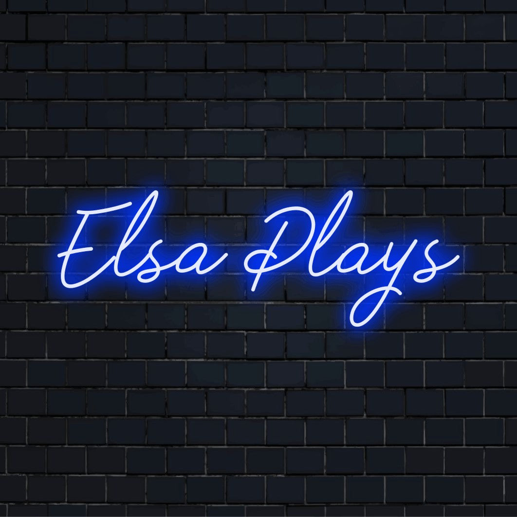 Elsa Plays Personalized Neon Light with glowing lettering against black brick wall