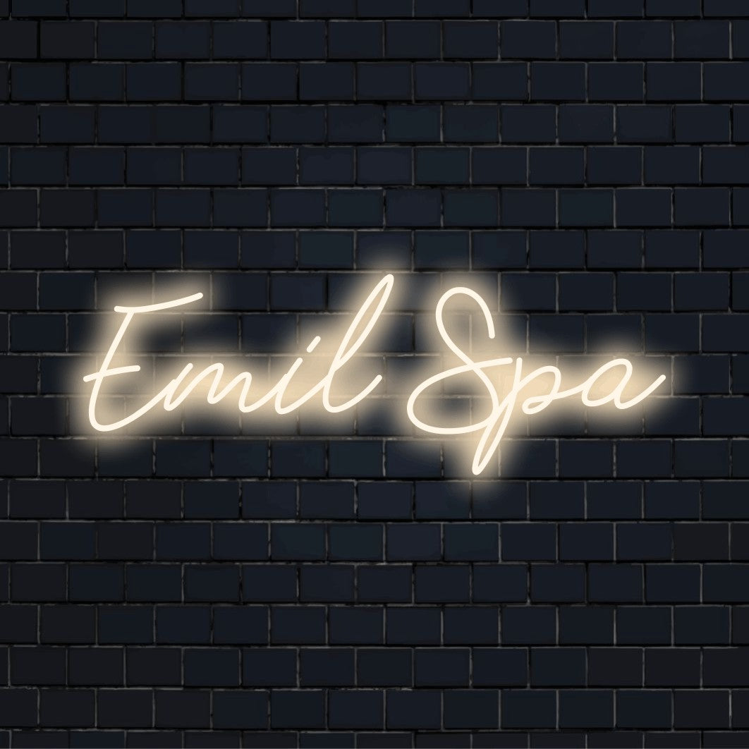 Emil Spa Personalized LED Neon Sign, bright LED glow on dark brick wall