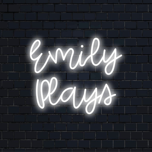 Emily Plays Custom Name Neon Sign, bright neon lettering on dark brick background