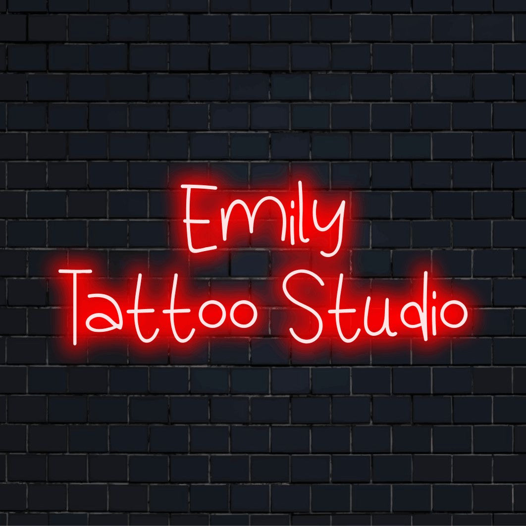 Emily Tattoo Studio Custom Name Neon Sign, bright LED glow against brick backdrop
