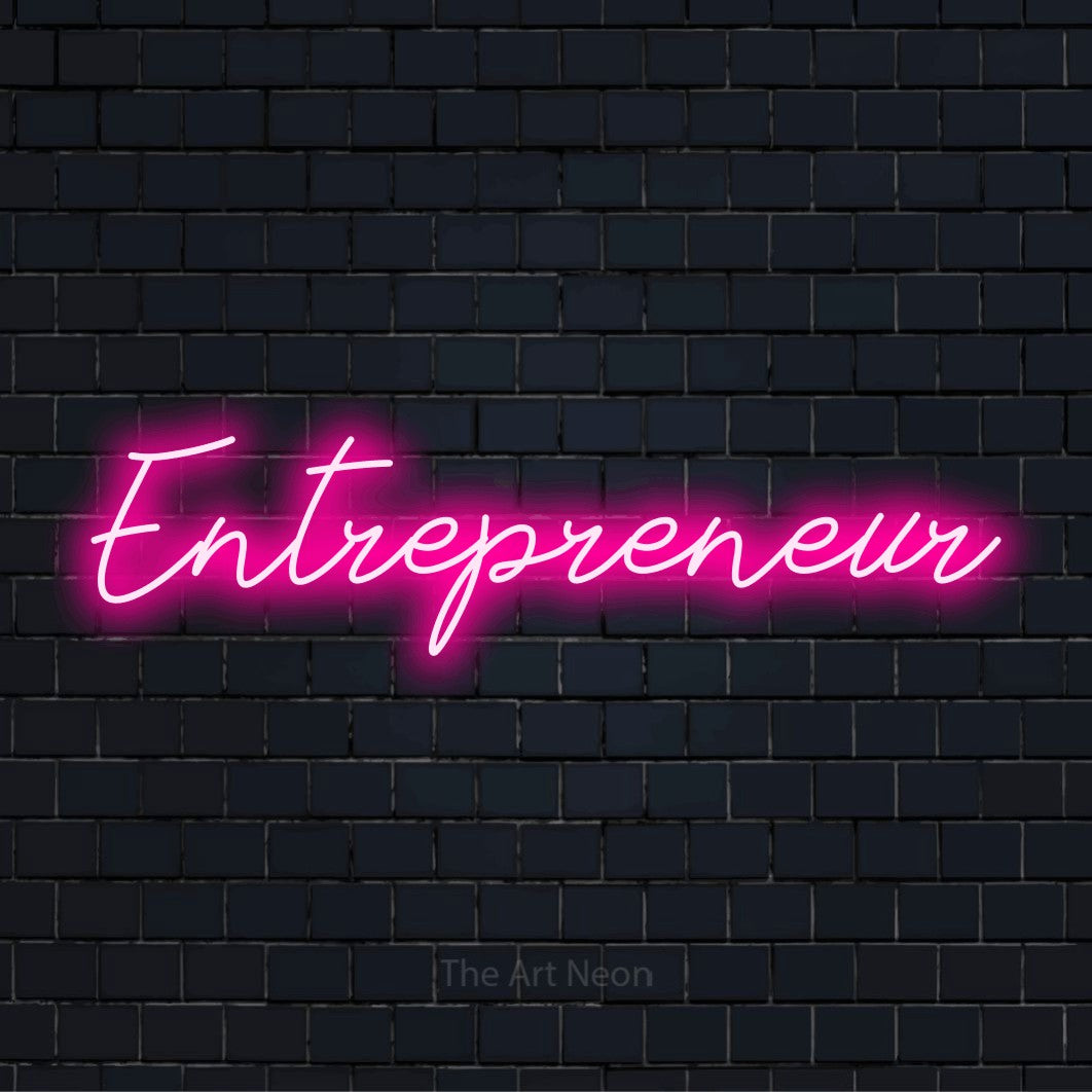"Entrepreneur" glowing LED neon sign on a black brick wall