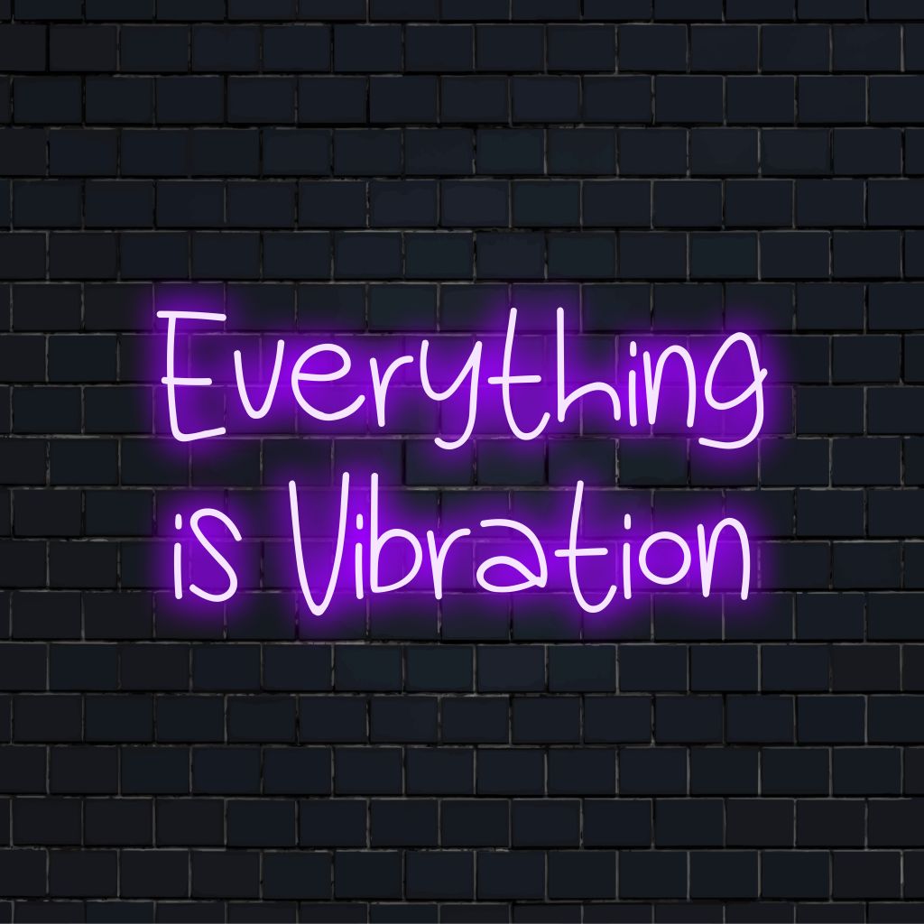 Everything Is Vibration Neon Sign, glowing wall decor against black brick wall