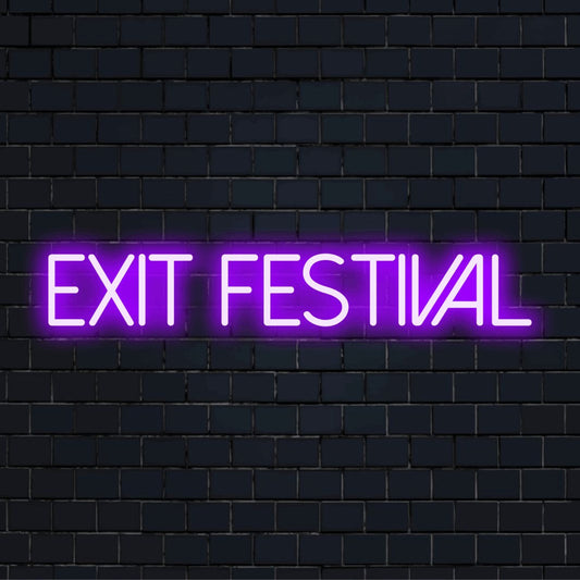Exit Festival Neon Light with glowing lettering on dark brick background