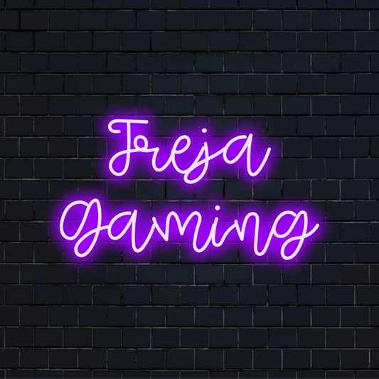 Freja Gaming Custom Name Neon Sign, bright LED glow against brick backdrop