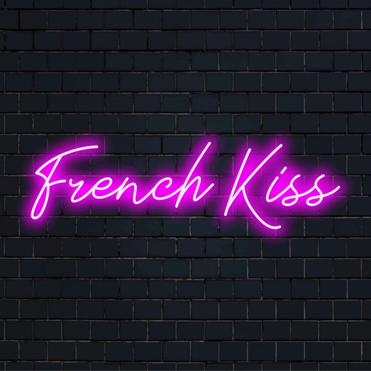 French Kiss Neon Light with bright LED glow on black brick background