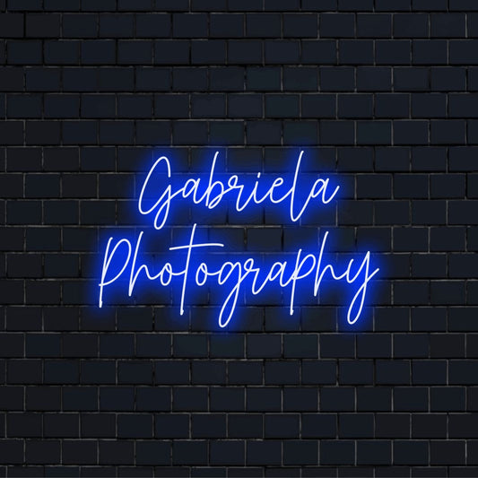 Gabriela Photography Personalized LED Neon Sign, bright LED glow against black brick wall