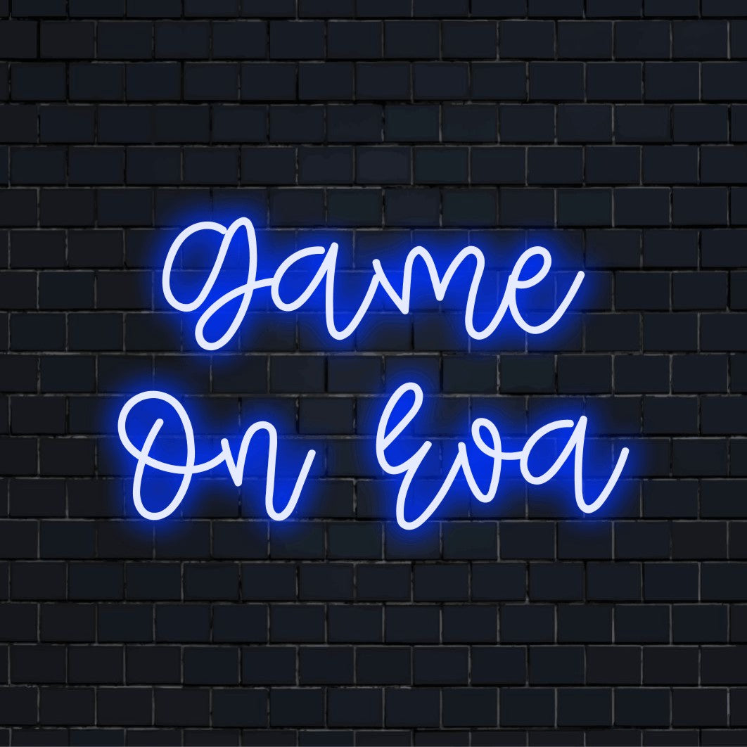 Game On Eva Personalized Neon Light with glowing lettering on dark brick wall