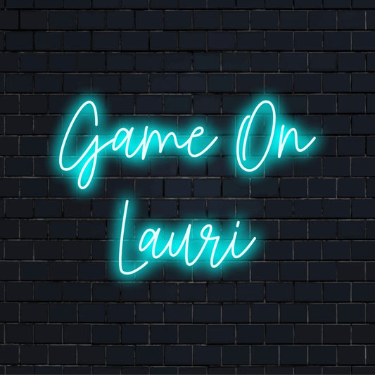Game On Lauri Personalized LED Neon Sign, glowing neon text on black brick background