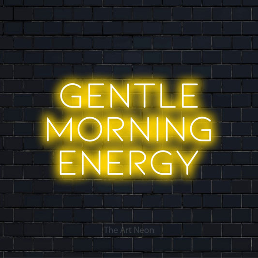 "Gentle Morning Energy" glowing LED neon sign on a black brick wall
