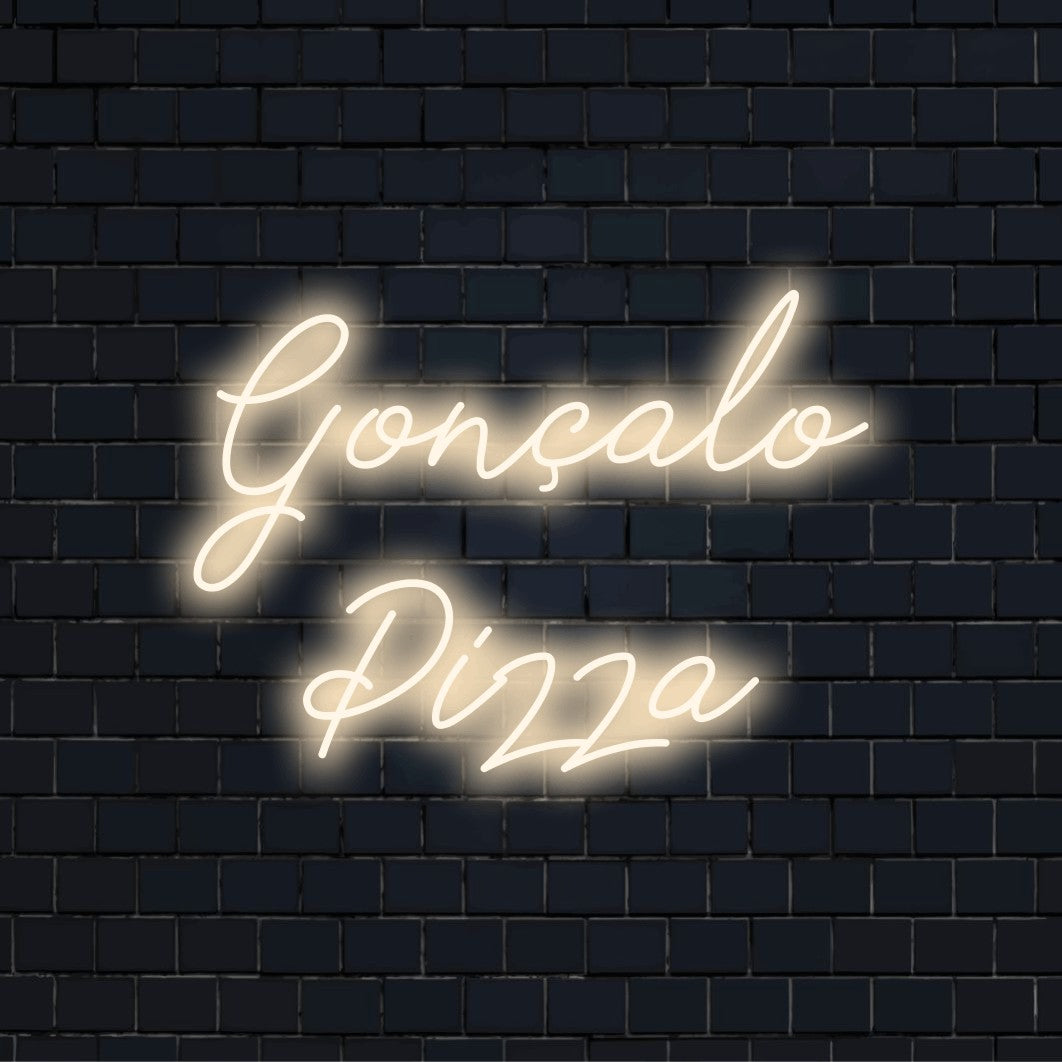 Goncalo Pizza Personalized Neon Light with bright neon lettering against brick backdrop