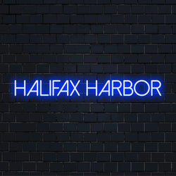 Halifax Harbor Neon Sign, glowing wall decor on dark brick wall
